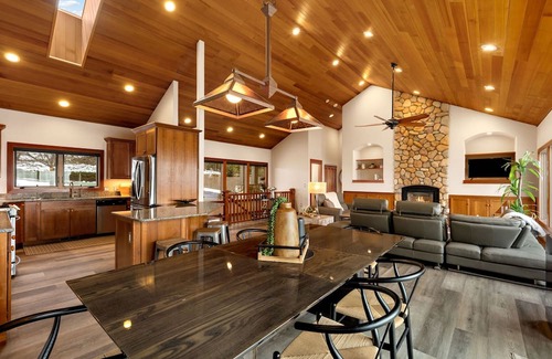 Sandpoint House | Waterfront home with private dock, beach, hot tub & wrap-around deck