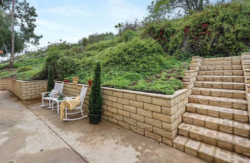 North Broadway House | Cozy Spanish villa with panoramic views, fire place, sauna and room to exhale!