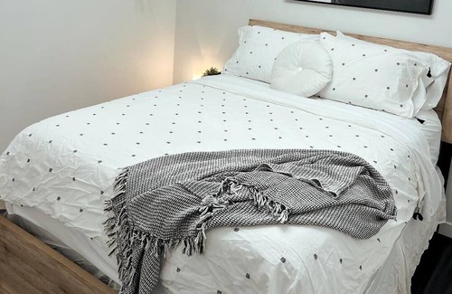 Kamloops House | Guest suite with cozy outdoor fire place and minutes from all local amenities
