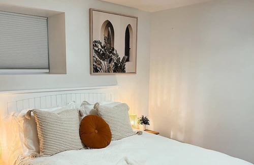 Kamloops House | Guest suite with cozy outdoor fire place and minutes from all local amenities
