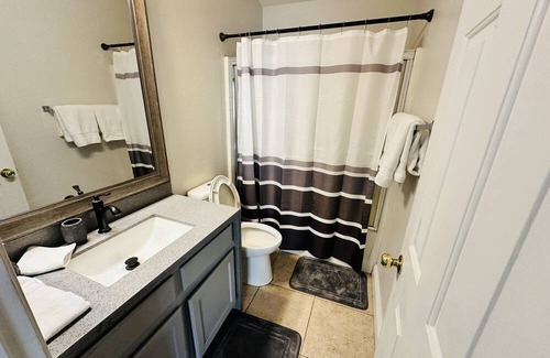 Sunrise Manor House | Enjoy the view of the entire city while playing mini golf in the patio.