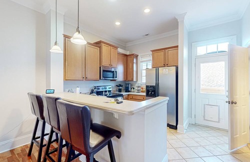 Greensboro House | Charming townhome in the city with a pool table, patio, full kitchen, A/C, & W/D