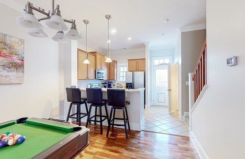 Greensboro House | Charming townhome in the city with a pool table, patio, full kitchen, A/C, & W/D