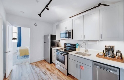 Wilson Apartment | The Whirlistay- family friendly, downtown Wilson, next to the whirligigs!