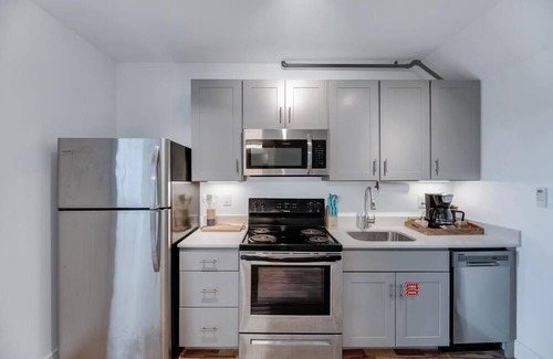 Wilson Apartment | The Whirlistay- family friendly, downtown Wilson, next to the whirligigs!