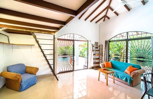 Puntarenas House | Macaws over head, monkeys in the distance, nature surrounding the pool…Pura Vida