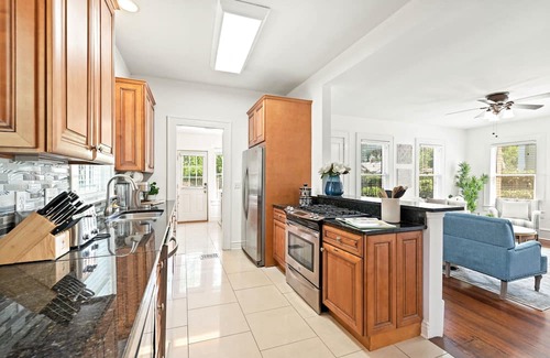 Five Points House | Remodeled charmer with work desk, enclosed yard, front porch, & chef's kitchen