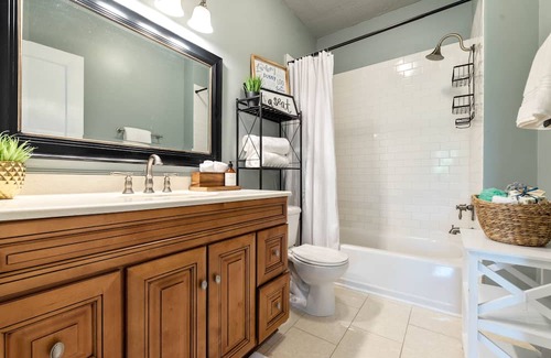 Five Points House | Remodeled charmer with work desk, enclosed yard, front porch, & chef's kitchen