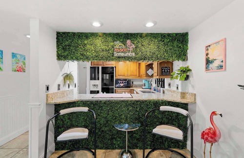 Paradise Lakes Condo | Flamingo Fling - Your Tropical Freedom Getaway