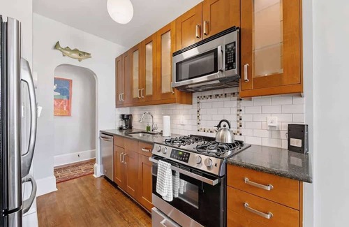 Cherry Condo | Refined Myers Park 2BR King Condo | Sunroom