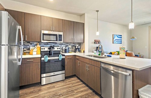 Vickery Meadow Apartment | Sunlit Suite w/Resort Pool & Gym by Midtown Blvd