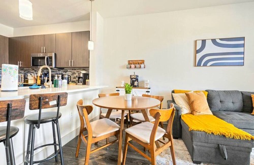 Vickery Meadow Apartment | Sunlit Suite w/Resort Pool & Gym by Midtown Blvd