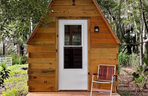 Reddick Cabin | Grass Campers whimsical 1 room Glamping Forest Hideaway Sugar Shanty near WEC
