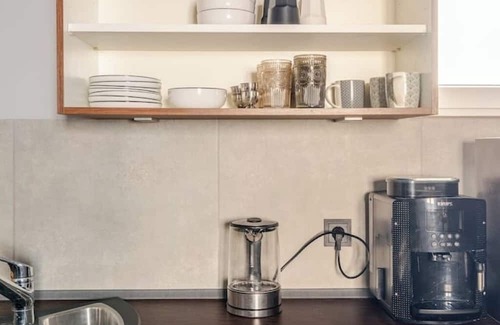 Wossingen House | Stylish loft with kitchen, carport, WiFi & fireplace