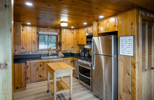 Freeland House | Charming waterfront home with fire pit and access to private beach
