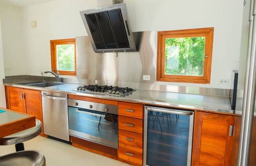 Playa Blanca House | Spacious 5-bedroom luxury villa with pool, golf view & Steps from the beach.