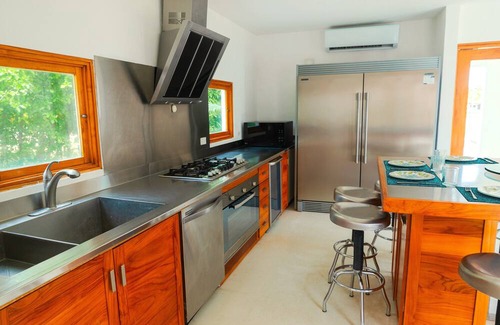 Playa Blanca House | Spacious 5-bedroom luxury villa with pool, golf view & Steps from the beach.