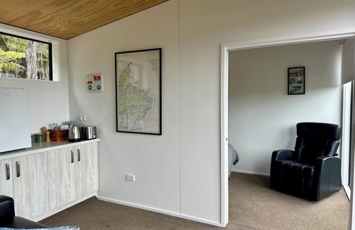 Moetapu Bay Cabin | A cosy two bedroom off-grid cabin, the perfect place to rest, relax & recharge.