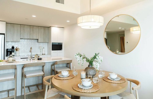 South Pandosy Condo | Enjoy lakefront living at its finest in this stylish condo! Relax by the pool, soak in the stunning water views, and unwind in comfort—just steps from the shoreline.