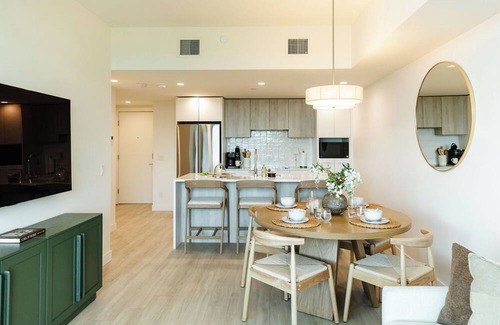 South Pandosy Condo | Enjoy lakefront living at its finest in this stylish condo! Relax by the pool, soak in the stunning water views, and unwind in comfort—just steps from the shoreline.