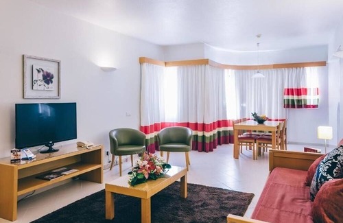 Oura Hotel | Spacious Family Apt w/Balcony, Kitchenette & Pool – 5-min Walk to Beach