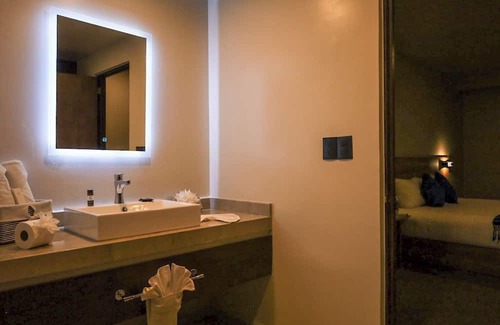 Tlaxcala Hotel | Comfortable room with king size bed in the heart of downtown Tlaxcala.