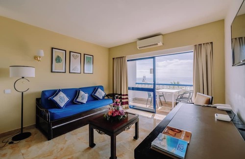 Oura Hotel | Convenient Stay in Oura Beach! 2 Modern Units with Full Kitchens and Balcony!