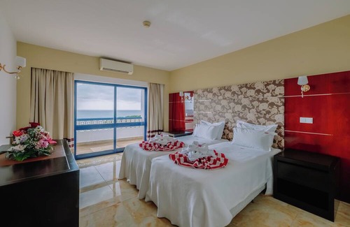 Oura Hotel | Convenient Stay in Oura Beach! 2 Modern Units with Full Kitchens and Balcony!