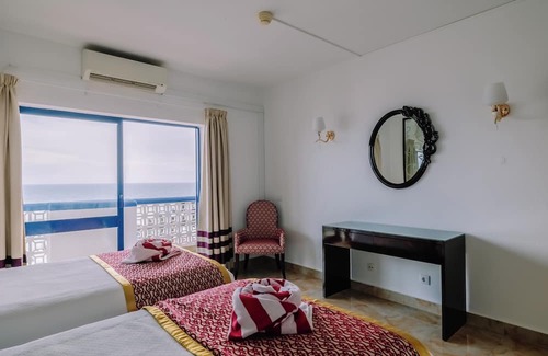 Oura Hotel | Convenient Stay in Oura Beach! 2 Modern Units with Full Kitchens and Balcony!