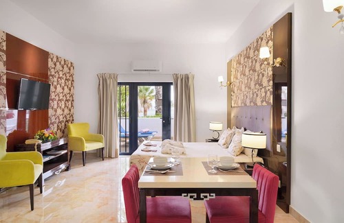 Oura Hotel | Group Getaway in Oura Beach! Four Sea View Units, Swimming Pools, Beachfront!
