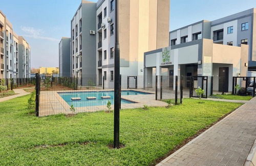 Gaborone Apartment | Zenith Retreat - Modern, Secure 2BR w/Pool