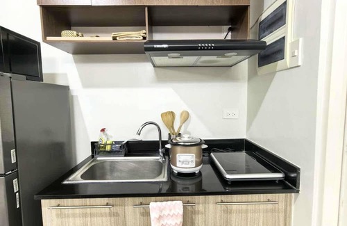 Puerto Princesa City Centre Apartment | Cozy Studio, Smart Lock, Balcony, Near Airport Puerto Princesa City, Palawan.