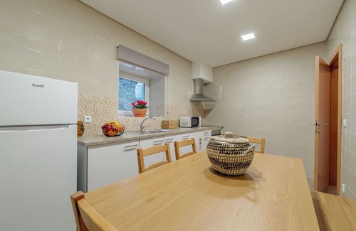 Vila Nova de Gaia House | Rustic and Modern Stone House by Host Wise