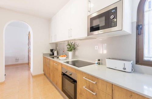 Corralejo Villa | Vacation Apartment 'Garcia' with Private Terrace, Private Garden and Wi-Fi