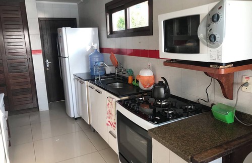 Torres House | House on the banks of the Mampituba River, enjoy the pool and the beautiful scenery.