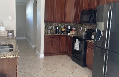 Port Saint Lucie House | Tropical Retreat 3 Bedroom 2 Bath Full House with saltwater pool & huge backyard