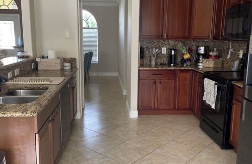 Port Saint Lucie House | Tropical Retreat 3 Bedroom 2 Bath Full House with saltwater pool & huge backyard
