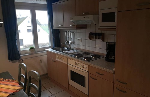 Stolpe b. Anklam Apartment | LHH A04 - Comfortable country house on the lagoon in Stolpe with balcony and garden view