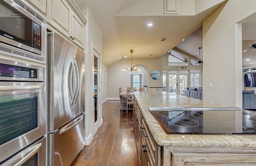April Sound House | Spacious lake house with kitchen, patio with great view on the water & boat slip