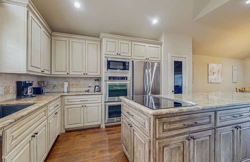April Sound House | Spacious lake house with kitchen, patio with great view on the water & boat slip