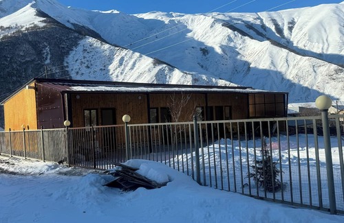 Kazbegi Apartment | A studio apartment at a secluded area by the river, surrounded by mountains.