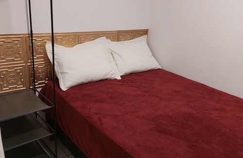 Matriz House | Quartos com área comum para hóspedes no Centro de Curitiba com WiFi