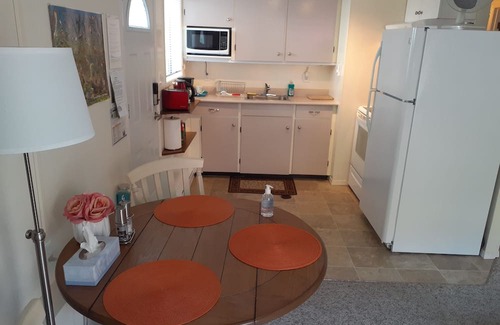 Booktown Apartment | Fully furnished garden suite one block from downtown, ocean in charming Sidney