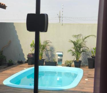 Campo Novo Do Parecis House | Quarto com piscina