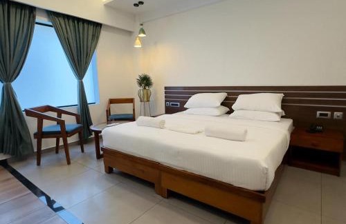 Thampanoor Hotel | De cloud 9 regency