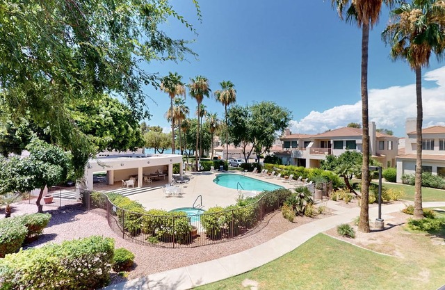 Charming house offers a resort-style pool and a friendly neighborhood