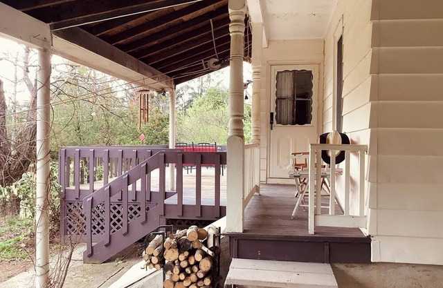 Bohemian Glow, this cozy home is surrounded by birds and a wildlife habitat.