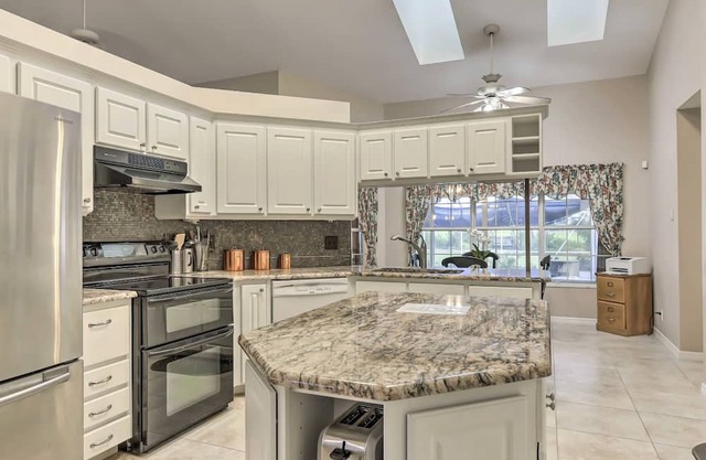 Dog-friendly home with screened patio, great yard & peaceful location