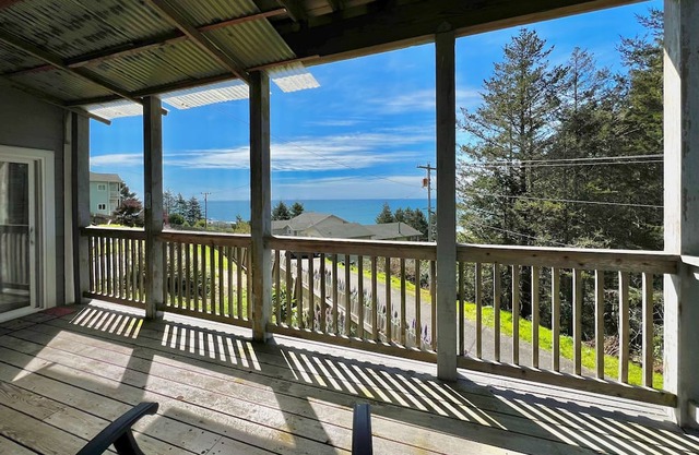 Dog-friendly wave-view home with beach access, firepit, grill, & enclosed yard