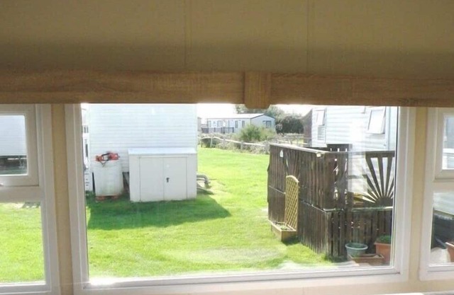 A small comfortable caravan, in a quiet location, with a lovely outside area to relax